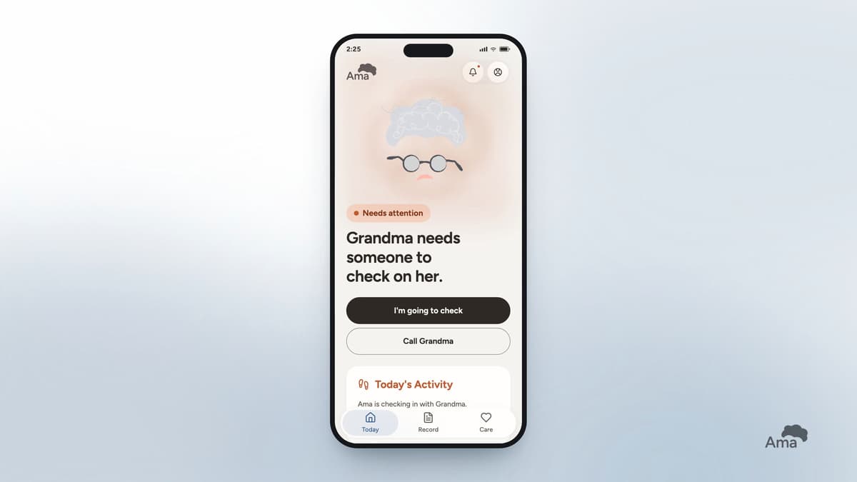 Ama's family app on a phone reading "Grandma needs someone to check on her", centered on a soft blurred silver-blue gradient, with the small Ama logo at the bottom right.